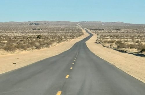 lonely-road-overlooked-california-desert_1632135-44